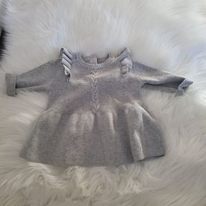 Knitted newborn dress